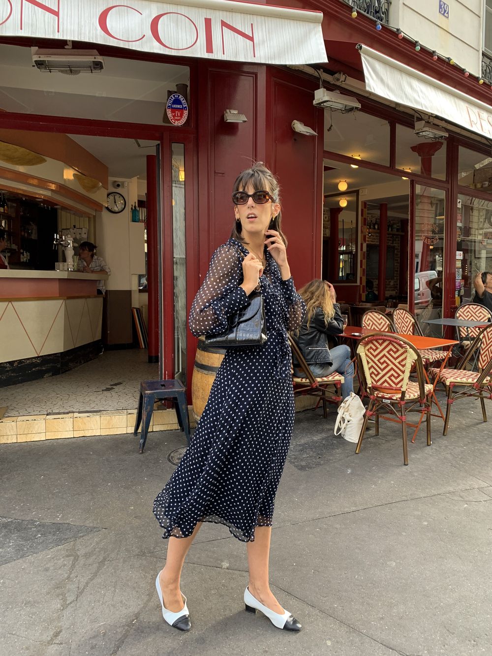 Diane Kari in a polka dot dress she designed in Montmartre, Parisian Brands, France