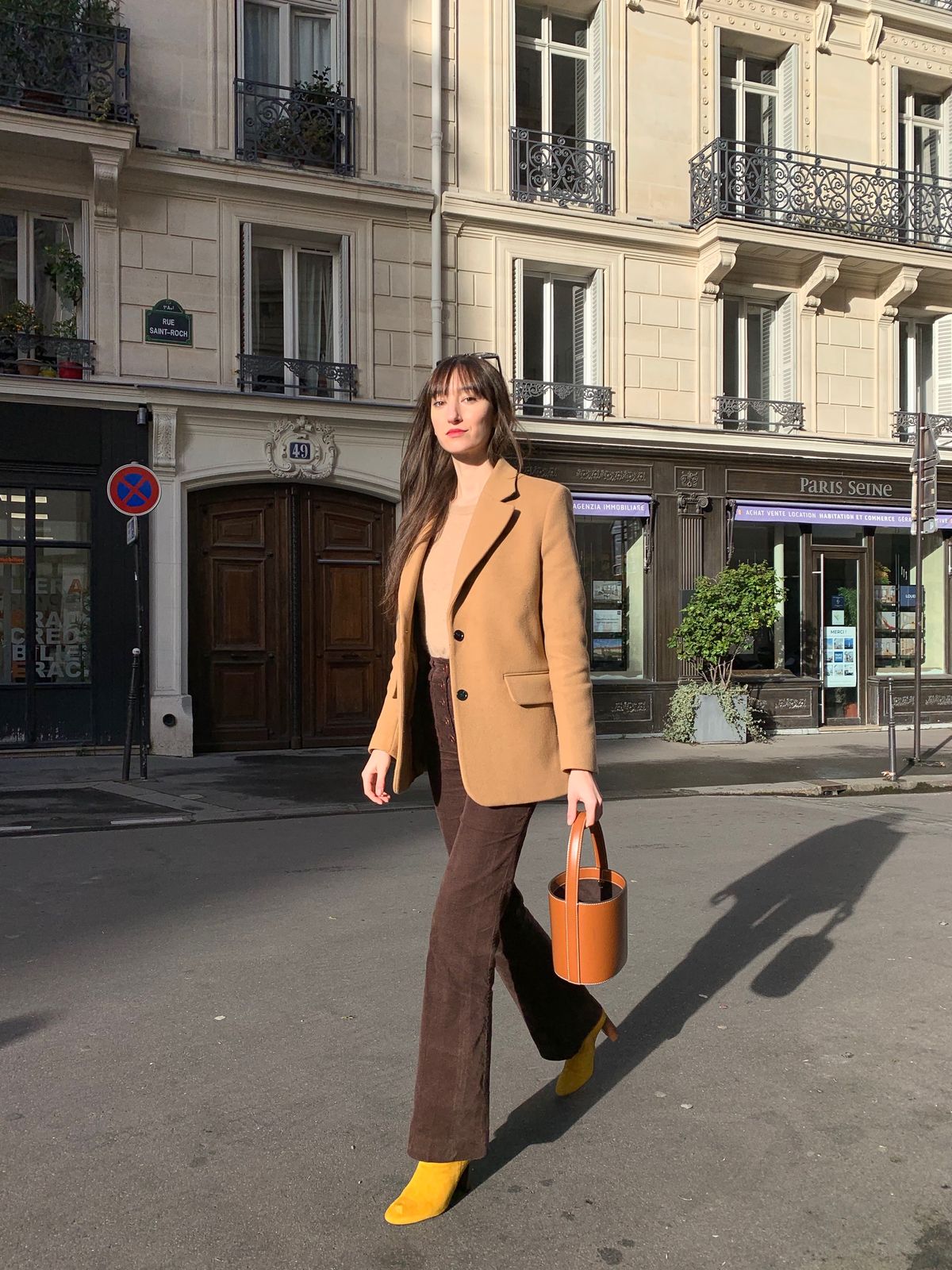 Parisian Winter Look: Staud bag, & Other Stories oversized wool blazer coat, Nathalie Dumeix Joplin pants in brown, Jonak mustard yellow boots outfit