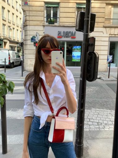 French Fashion Brands to Know if You Love French Style - by Victoria Petersen - wearing a Figaret button-up shirt, Carel handbag, Rouje jeans, and Rendel sunglasses